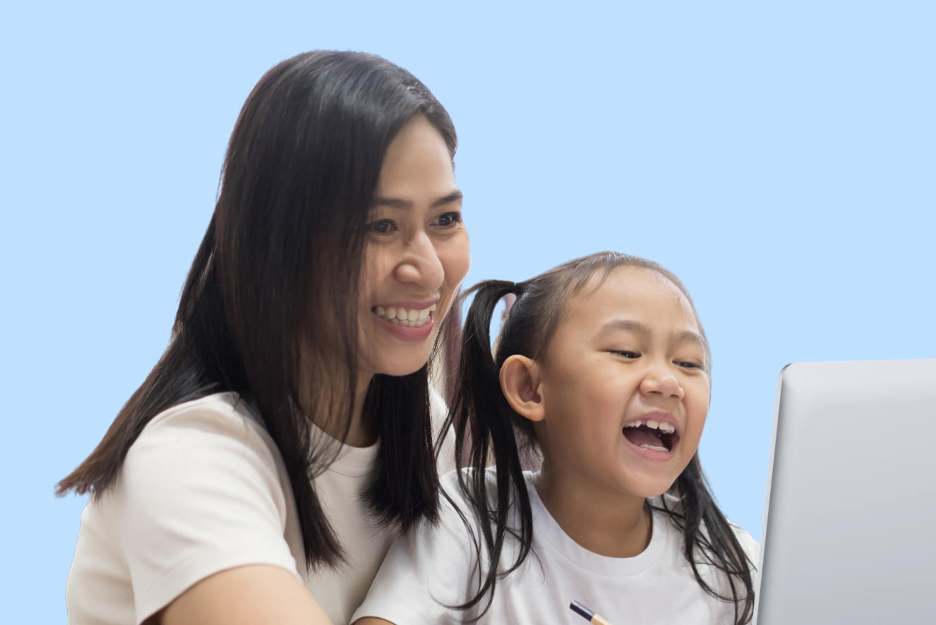 Parent and child in front of a computer.